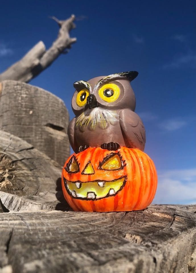 Hand-painted owl on a jack-o'-lantern